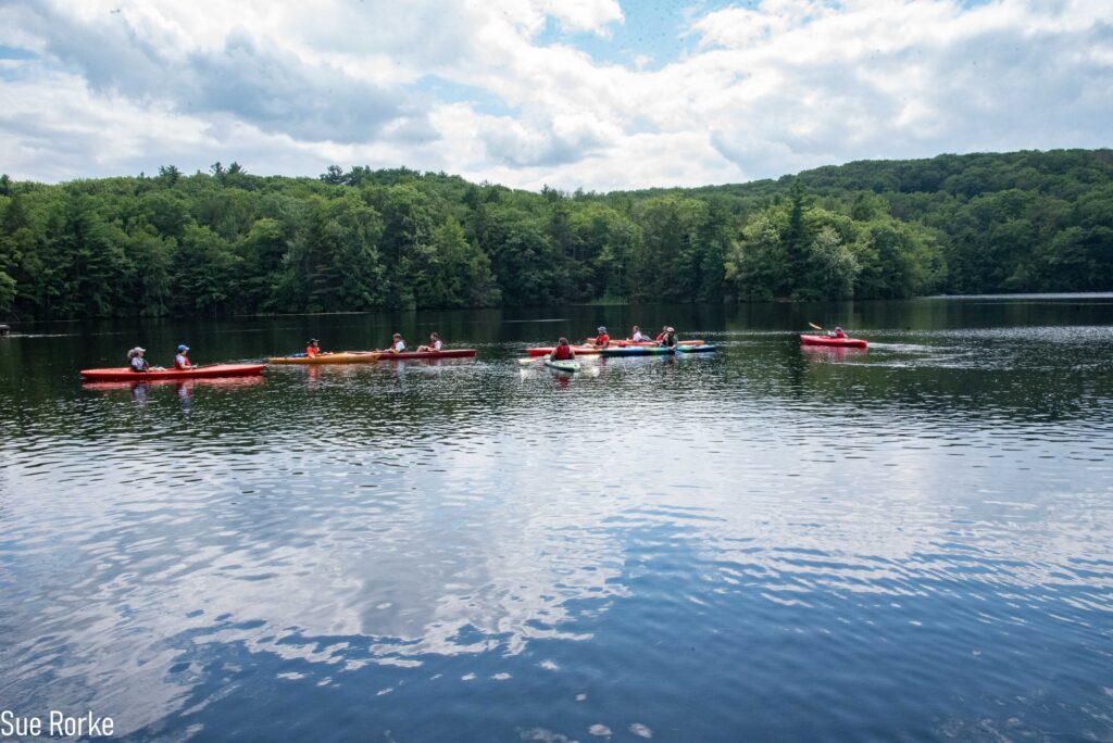 view of pond with kayaks