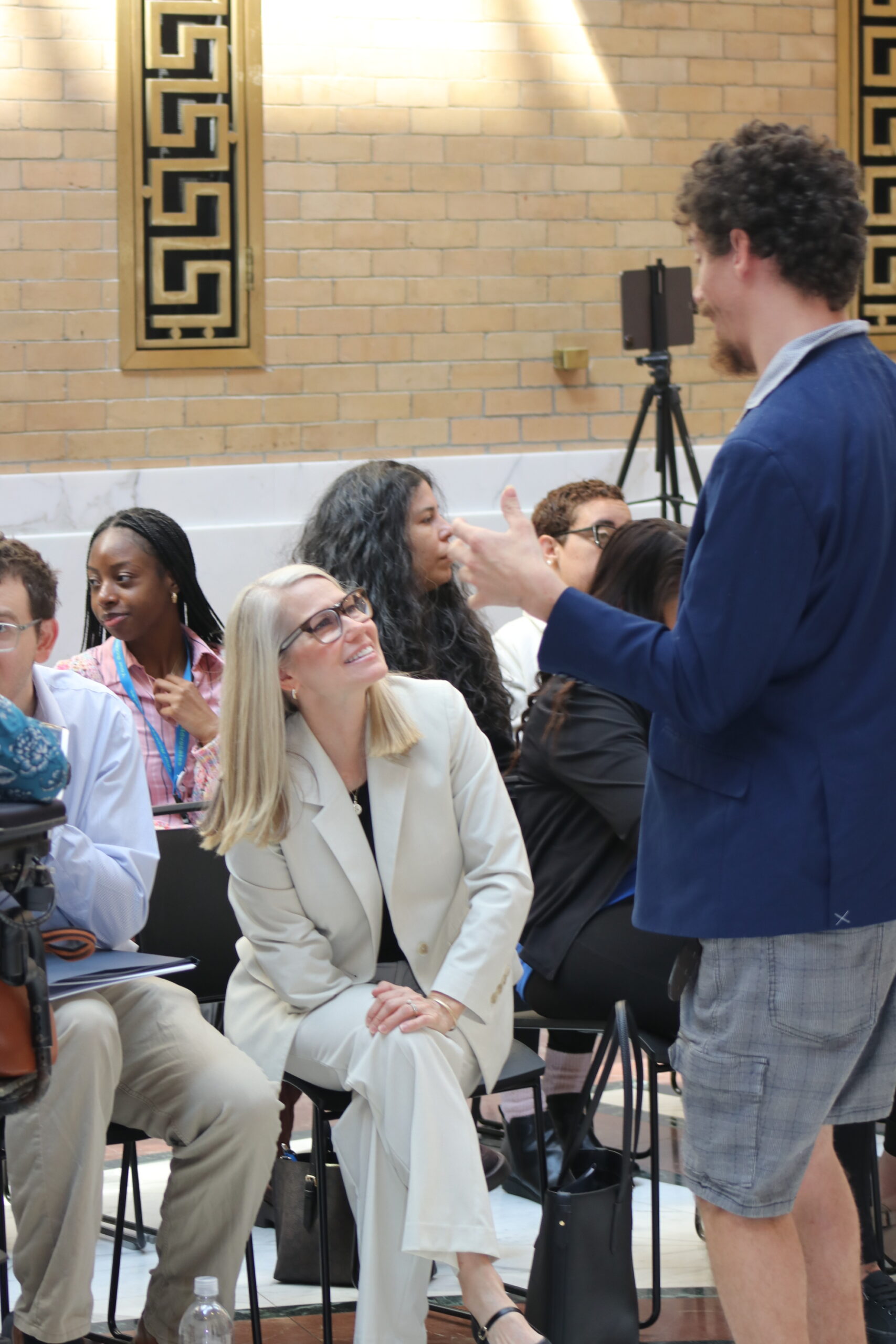 Jennifer Bertrand, MDDC and Cody Rooney talking and smiling 