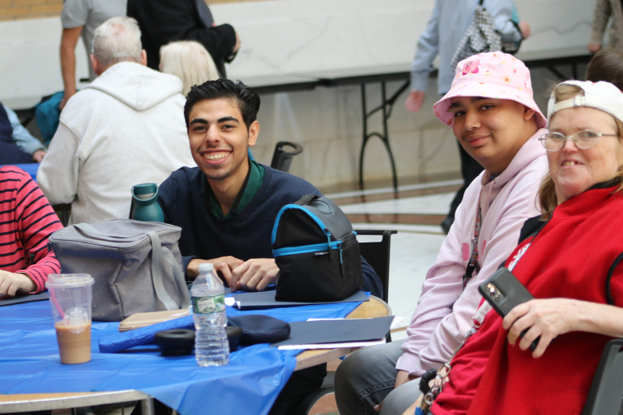 Audience members smiling