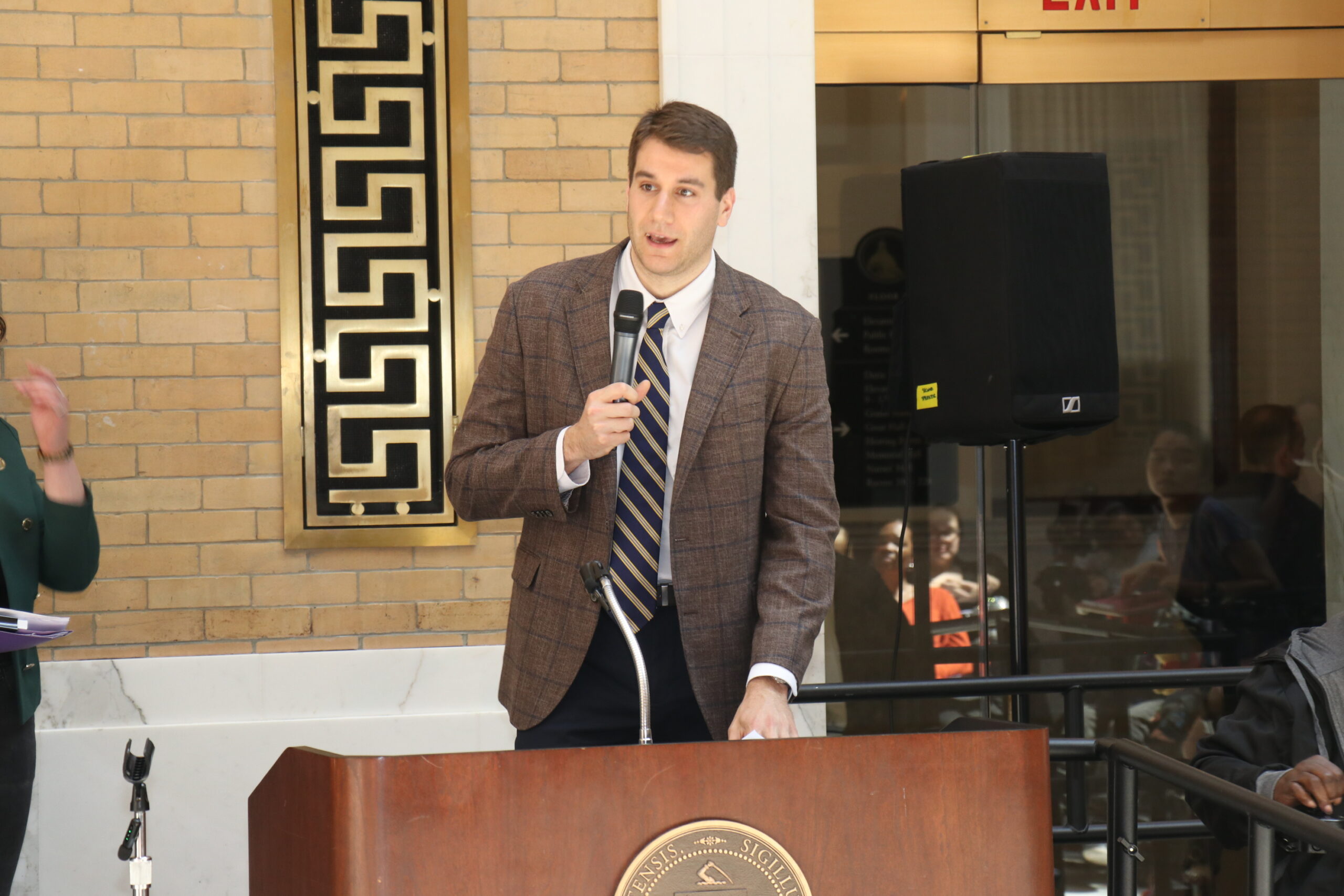 Brian Kleckner speaking at a podium