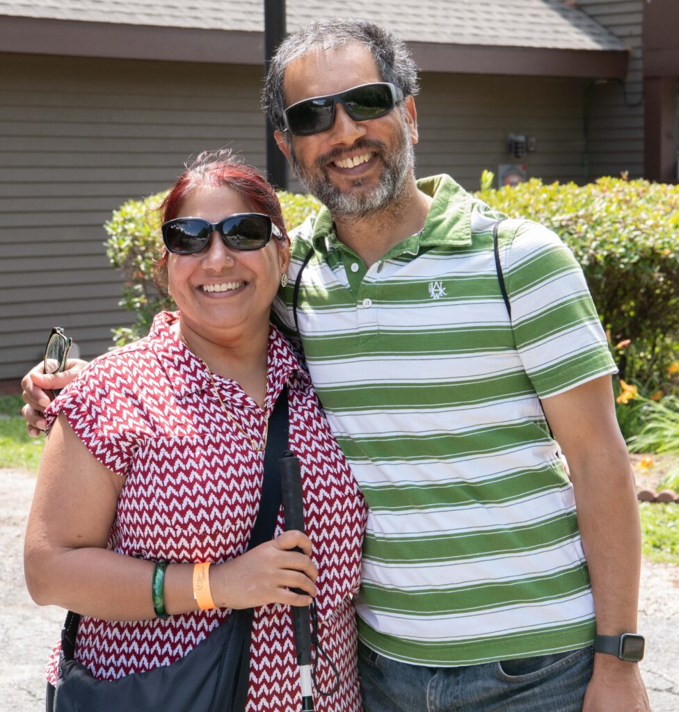 man and woman smiling