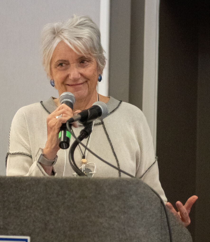 Commissioner Toni Wolf, MassAbility, speaking with microphone