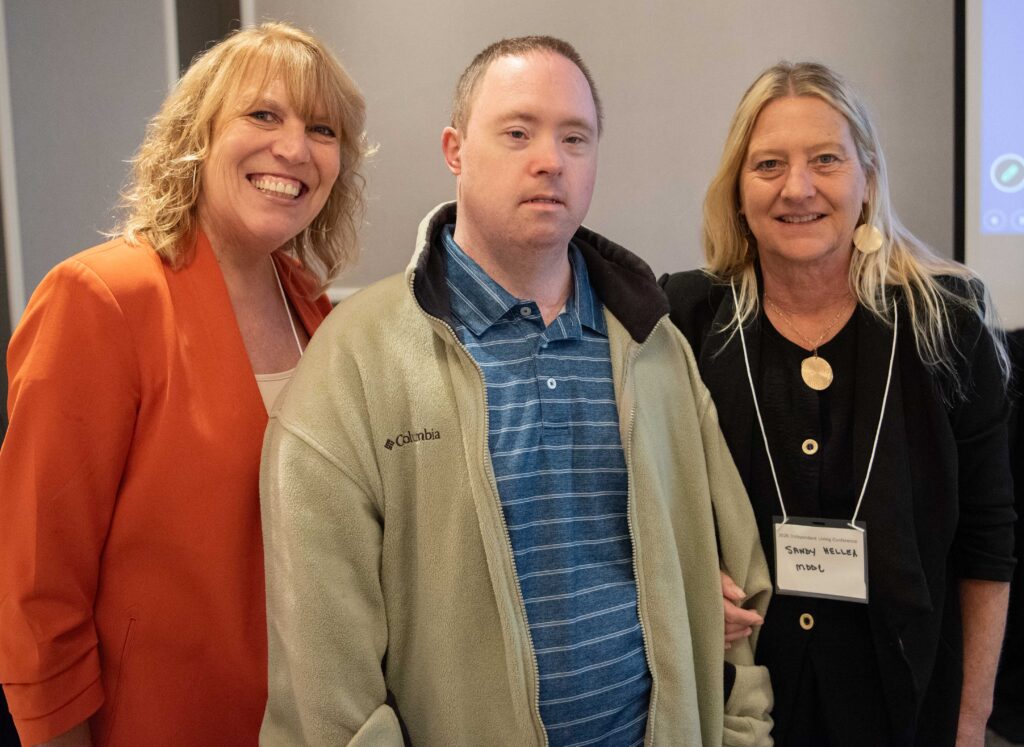 Lee Larriu, Massachusetts Developmental Disabilities Council, Craig Kinney and Sandy Heller posing for a photo