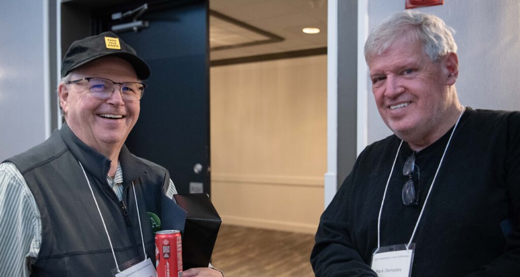 Steve and Mark smiling for a photo