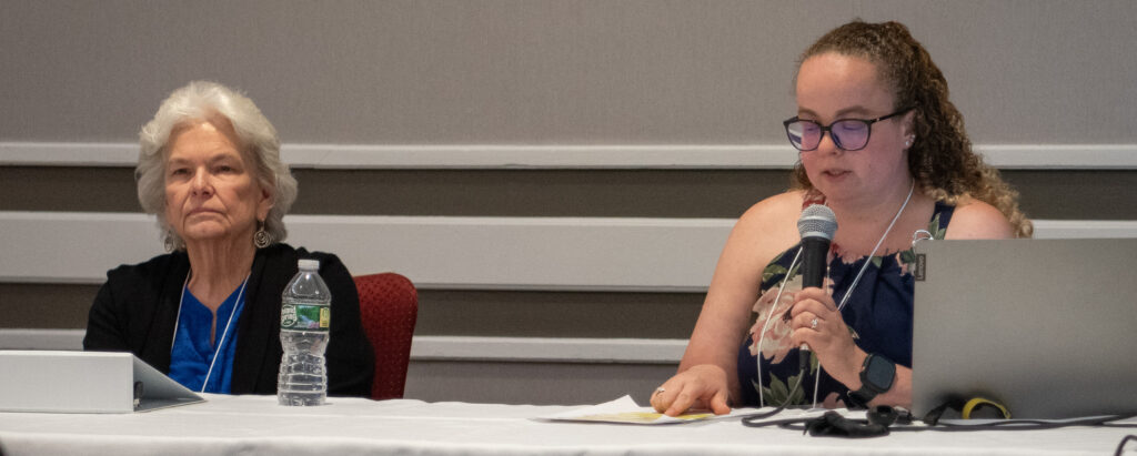 (l-r) Joan Philip, and MacKenzie Bonaiuto speaking with a microphone